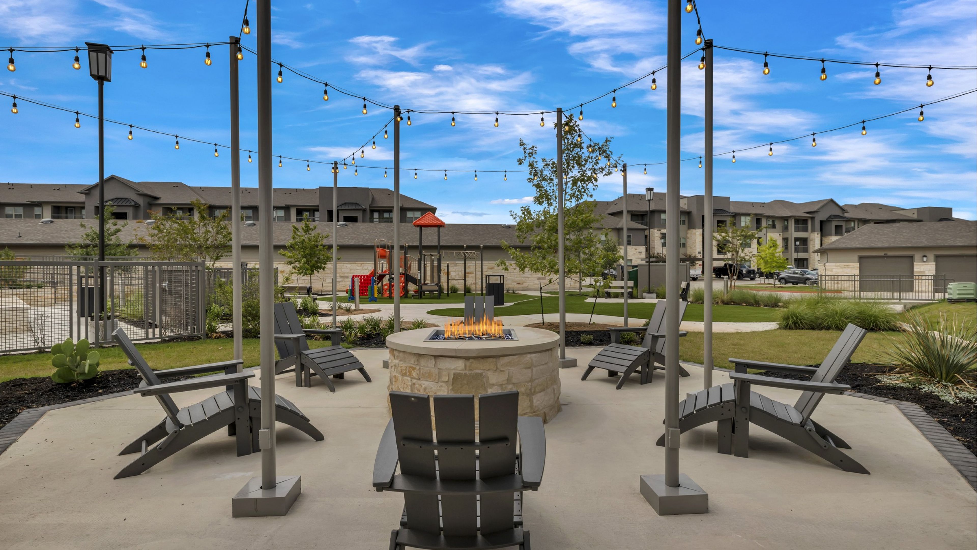 Hawthorne at Blanco Riverwalk outdoor fire pit with lounge chairs